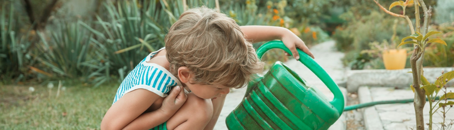 Little boy in garden